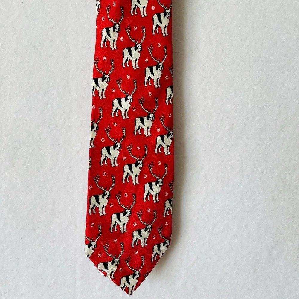 The Big Dogs 100% silk tie pattern of dogs wearing antlers on‎ a red background